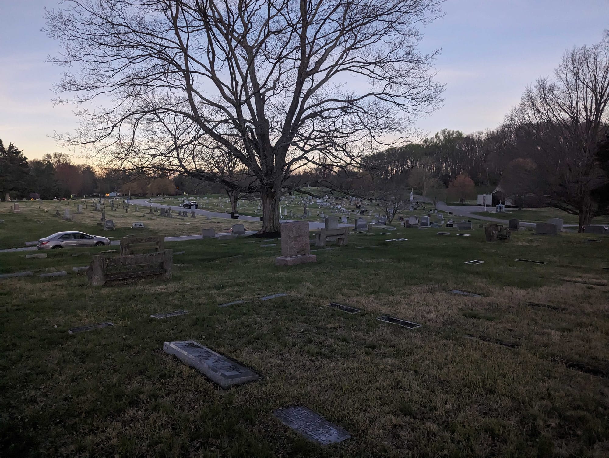 A cemetery seen during twilight of a solar eclipse