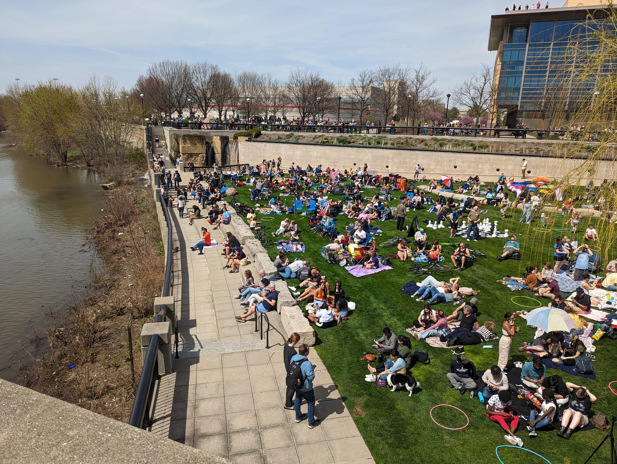 Crowds gather on the waterfront of White River State Park in Indianapolis in preparation for the total eclipse. 