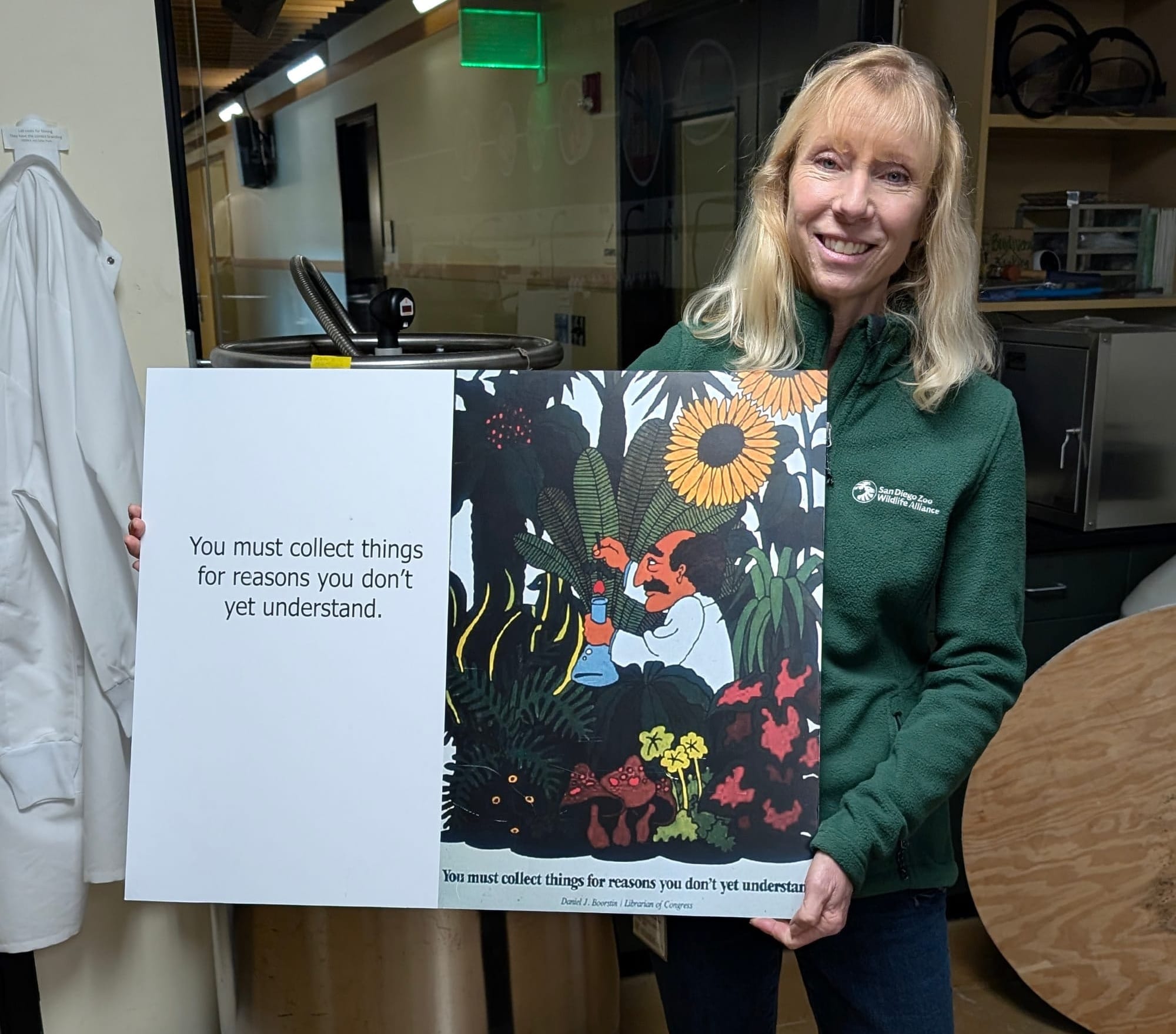Frozen Zoo curator Marlys Houck showing a poster with the biobank's guiding principle: “You must collect things for reasons you don’t yet understand.”